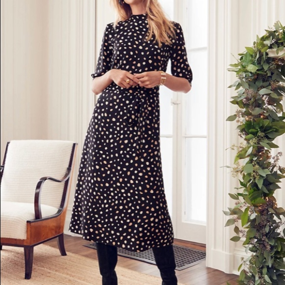 Mock neck black dress.